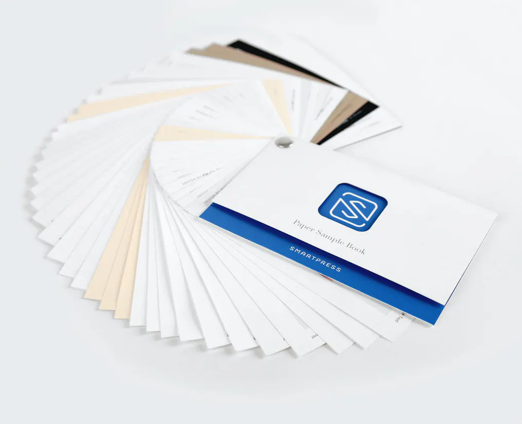 Smartpress' free paper sample book with the samples fanned out in a circle.