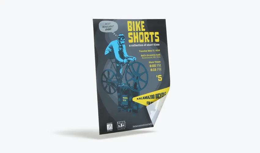 A custom backlit sign printed with Bike Shorts in yellow and a graphic of a person on a bike.