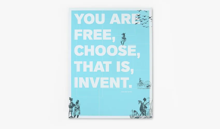 A honeycomb cardboard sign printed with a blue background and You Are Free, Choose, That is Invent.